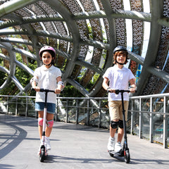 Caroma Electric Scooter for Kids Ages 8-12, Max 7 Miles Range and 10 Mph Max Speed, Colorful Rainbow Light, UL2272 Certification, Lightweight Electric Scooter with Adjustable Height